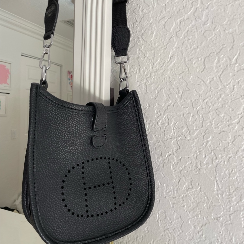 Crossbody body “H” Clemence Evelyne  look bag. with H punch out logo.
